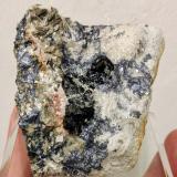 Casiterita, Cuarzo, Molibdenita, Moscovita, FeldespatoMari Tere Mine, Mining Group Minero Feli, Lumbrales, Comarca El Abadengo, Salamanca, Castile and León, Spain5,8 x 6,2 cm. (Autor: Carles)