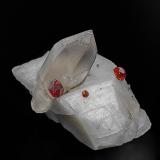 Quartz (variety smoky quartz), Spessartine, Microcline<br />Audrey Lynn Mine, Little Cahuilla Mountain, Cahuilla District, Riverside County, California, USA<br />5.5 x 4.0 cm<br /> (Author: am mizunaka)