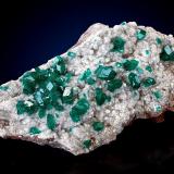DioptaseTsumeb Mine, Tsumeb, Otjikoto Region, NamibiaSpecimen size 8,5 cm, largest crystals 8 mm (Author: Tobi)
