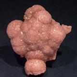 Rhodochrosite on Hisingerite-Neotocite (Series)Distrito Santa Eulalia, Municipio Aquiles Serdán, Chihuahua, México6.2 × 5.8 × 3.6 cm (Author: Jordi Fabre)
