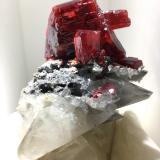 Realgar on Calcite<br />Jiepaiyu Mine (Shimen Mine), Shimen County, Changde Prefecture, Hunan, China<br />4 cm crystal<br /> (Author: Jean Suffert)