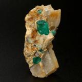 Beryl (variety emerald), Calcite<br />Peñas Blancas Mine, Municipio San Pablo de Borbur, Western Emerald Belt, Boyacá Department, Colombia<br />41mm x 21mm x 19mm, group=7mm<br /> (Author: Fiebre Verde)