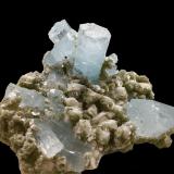 Beryl (variety aquamarine) on Muscovite and Albite<br />Nagar, Hunza Valley, Nagar District, Gilgit-Baltistan (Northern Areas), Pakistan<br />13 X 10 cm, biggest crystal 4.5 cm<br /> (Author: Jean Suffert)