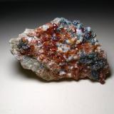 Grossularia (variedad hessonita), Diópsido, Clinocloro<br />Val d'Ala, Valles Lanzo (Valli di Lanzo), Provincia Ciudad metropolitana de Turín, Piamonte (Piemonte), Italia<br />57 x 37 mm<br /> (Autor: Sante Celiberti)