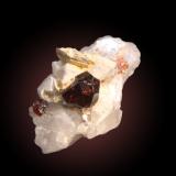 Spessartine, Muscovite and Quartz.Seydar, Hoh Nala, Braldu Valley, Shigar District, Gilgit-Baltistan (Northern Areas), Pakistan25mm x 32mm x 25mm (Author: Firmo Espinar)