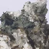 Epidote, Quartz, Titanite, Orthoclase (variety Adularia), Prehnite<br />Baveno, Maggiore Lake, Verbano-Cusio-Ossola Province, Piedmont (Piemonte), Italy<br />4 x 3,5 cm<br /> (Author: Volkmar Stingl)