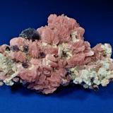 Rhodochrosite, Fluorite, Barite, Apatite<br />Wutong Mine, Liubao, Cangwu, Wuzhou Prefecture, Guangxi Zhuang Autonomous Region, China<br />78 mm x 54 mm x 37 mm<br /> (Author: Don Lum)