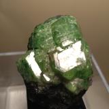 Tsavorite, Graphite<br />Merelani Hills, Lelatema Mountains, Simanjiro District, Manyara Region, Tanzania<br />43 x 37 mm<br /> (Author: Sante Celiberti)