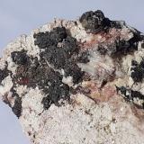 Descloizite, Baryte, Dolomite<br />Hochobir mining district, Hochobir Mountain, Eisenkappel-Vellach, Völkermarkt District, Carinthia/Kärnten, Austria<br />FoV 1,5 x 1 cm<br /> (Author: Volkmar Stingl)