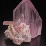 Spodumene var. Kunzite with 
Elbaite (Tourmaline) and Albite.
Laghman Prov., Afghanistan
9.8 x 10.3 x 5.7 cm (Author: Gail)