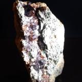 Grossularia (variedad hessonita), Clinochloro<br />Testa Ciarva, Balme, Val d'Ala, Valles Lanzo (Valli di Lanzo), Provincia Ciudad metropolitana de Turín, Piamonte (Piemonte), Italia<br />80 x 52 mm<br /> (Autor: Sante Celiberti)
