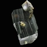 Ferberite (Wolframite Group) and Siderite<br />Tazna Mine (Tazna-Rosario Mine), Cerro Tazna, Atocha-Quechisla District, Nor Chichas Province, Potosí Department, Bolivia<br />7 x 4 cm Ferberite and 1.5 x 1.5 cm Siderite<br /> (Author: Jean Suffert)