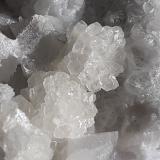 Quartz, Calcite<br />Chongxiu tunnel (construction site), Wuyishan, Nanping Prefecture, Fujian Province, China<br />6 x 5,5 cm<br /> (Author: Volkmar Stingl)