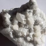 Quartz, Calcite<br />Chongxiu tunnel (construction site), Wuyishan, Nanping Prefecture, Fujian Province, China<br />6 x 5,5 cm<br /> (Author: Volkmar Stingl)