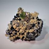 Ludlamite, Sphalerite, Siderite, Pyrite, QuartzTrep&#269;a Complex, Trep&#269;a Valley, Kosovska Mitrovica, Kosovska Mitrovica District, Kosovo36 mm x 29 mm x 21 mm (Author: Don Lum)