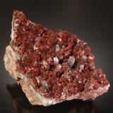Beta-Roselite and Calcite<br />Oumlil Mine, Oumlil, Bou Azzer mining district, Zagora Province, Drâa-Tafilalet Region, Morocco<br />7.9 x 4.5 x 4.2 cm.<br /> (Author: Michael Shaw)