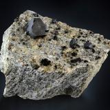 Cafarsite<br />Wannigletscher, Scherbadung (Monte Cervandone), Kriegalp Valley, Binn Valley (Binntal), Wallis (Valais), Switzerland<br />12 x 9 x 6.5 cm / main crystal: 2.6 cm.<br /> (Author: MIM Museum)