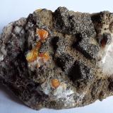 Wulfenite, Vanadinite (variety Endlichite)<br />Erupción Mine (Ahumada Mine), Los Lamentos Mountain Range, Municipio Ahumada, Chihuahua, Mexico<br />7 x 4 cm<br /> (Author: Volkmar Stingl)