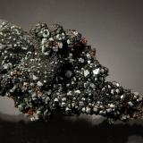 Cuprite on Goethite<br />Czar Mine, Copper Queen Mine, Queen Hill, Bisbee, Warren District, Mule Mountains, Cochise County, Arizona, USA<br />6.0 x 3.5 x 2.4 cm<br /> (Author: Michael Shaw)