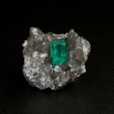 Beryl (variety emerald), Calcite, Dolomite<br />La Pita mining district, Cunas Mine, Municipio Maripí, Western Emerald Belt, Boyacá Department, Colombia<br />24 x 18 x 24 mm, xl=9 x 5 mm<br /> (Author: Fiebre Verde)