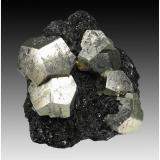 Pyrite on HematiteRio Mine (Rio Marina Mine), Valle Giove stope, Rio Marina, Elba Island, Livorno Province, Tuscany, Italy14 cm x 12 cm x 9 cm (Author: silvia)