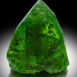 Forsterite (variety peridot)<br />Sapat Gali (Suppat), Naran, Kaghan Valley, Mansehra District, Khyber Pakhtunkhwa, Pakistan<br />4 x 4 x 5 cm<br /> (Author: MIM Museum)