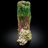 Elbaite with Albite (variety cleavelandite)<br />Paprok, Kamdesh District, Nuristan Province, Afghanistan<br />9 x 9 x 28 cm / main crystal: 27.0 cm.<br /> (Author: MIM Museum)