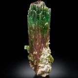 Elbaite with Albite (variety cleavelandite)<br />Paprok, Kamdesh District, Nuristan Province, Afghanistan<br />9 x 9 x 28 cm / main crystal: 27.0 cm.<br /> (Author: MIM Museum)