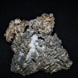 Silver with Bornite<br />Silver Miller Mine, Coleman Township, Cobalt area, Cobalt-Gowganda Region, Timiskaming District, Ontario, Canada<br />6.8x5.8x1.6 cm''s<br /> (Author: Joseph DOliveira)