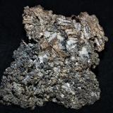 Silver with Bornite<br />Silver Miller Mine, Coleman Township, Cobalt area, Cobalt-Gowganda Region, Timiskaming District, Ontario, Canada<br />6.8x5.8x1.6 cm''s<br /> (Author: Joseph DOliveira)