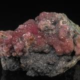 Rhodochrosite<br />Potosí Mine, level 10, Santo Domingo (Francisco Portillo), Santa Eulalia District, Municipio Aquiles Serdán, Chihuahua, Mexico<br />9.2 x 6.6 cm<br /> (Author: am mizunaka)