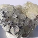 Prehnite, Graphite<br />Merelani Hills, Lelatema Mountains, Simanjiro District, Manyara Region, Tanzania<br />2,5 x 1,5 cm<br /> (Author: Volkmar Stingl)