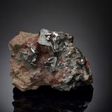 Nickelskutterudite<br />Schneeberg District, Erzgebirgskreis, Saxony/Sachsen, Germany<br />5.5 x 4 x 3.5 cm / main crystal: 1.3 cm<br /> (Author: MIM Museum)