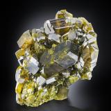 Epidote<br />Antronapiana, Verbania, Verbano-Cusio-Ossola Province, Piedmont (Piemonte), Italy<br />6 x 8 x 4 cm / main crystal: 3.7 cm<br /> (Author: MIM Museum)