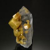 Siderite on QuartzMuzo (distrito minero), Cinturón Esmeraldífero Occidental, Departamento Boyacá, Colombia3.1 x 1.9 cm (Author: Michael Shaw)