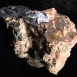 Molybdenite, Biotite, FeldsparKhoroshiv (Volodarsk-Volynskii), Oblast Zhytomyr, Ucrania100 mm X 85 mm X 85 mm (Author: Robert Seitz)