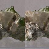 Olivine series, Forsterite var.Peridot with Calcite; Sapat Gali (Soppat), Kohistan, Pakistan.
50x35x33mm, 56g. GN’s collection id 09PKOcm01.
Taken in direct sunlight. Stereo pair. (Author: Gerhard Niklasch)