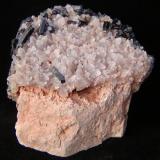 Schorl on clear Quartz to 1.5 cm. on Feldspar. 
Klein Spitzkoppe, Erongo Region, Namibia.
5.5 x 5 x 4cm
Crystals of Schorl to 1.1cm (Author: Debbie Woolf)