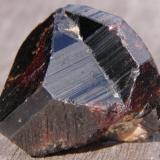 Cassiterite twin.
Krantzberg Mine, Omaruru, Namibia.
3.1cm x 2.3cm x 2.9cm (Author: Debbie Woolf)