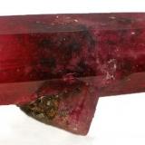 Red beryl, d/t, Wah Wah Mtns, Utah. 2.4 x 1 x 1 cm. (Author: Jim)