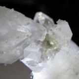 Cluster of stilbites near the point where the two large fluorapophyllite crystals intersect (Author: Tracy)