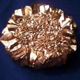 Here is a busy piece in this Pyrite crystal "Sunflower" from the Zhuang Autonomous Region, China. It is 3 1/4" in diameter (8,3cm). It could be used as a paper weight but I’d rather not. (Author: Jim Prentiss)