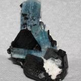 Aquamarine and schorl crystals with some feldspar from Erongo Mountain, Namibia. 7x5x4 cm. (Author: Jessica Simonoff)
