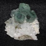 Fluorite on quartz with pyrite from Hunan Province, China. 4x4x3 cm. (Author: Jessica Simonoff)