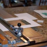 My mat cutter and workspace, the trusty ole kitchen counter. (Author: Gail)