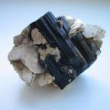Nice schorl crystals (3,5 cm) with muscovite from the Papiermühle granite gravel pit near Selb, Fichtelgebirge, Bavaria. (Author: Andreas Gerstenberg)