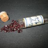 Old vial with rounded pyrope crystals ("Bohemian Garnet") from Zöblitz, Erzgebirge, Saxony, a famous pyrope locality. (Author: Andreas Gerstenberg)