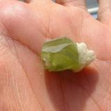 Green sphalerite twin with some white prehnite from Steinperf quarry, Sauerland, Hesse. The green sphalerites from Steinperf (and from the nearby location Hartenrod too) are very much sought-after - sometimes they have been cut and faceted! (Author: Andreas Gerstenberg)