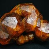 Large Spessartine cluster, Nani, Loliondo, Arusha Region, Tanzania

Size 70 x 60 x 65 mm (Author: olelukoe)