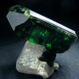 Deepest green coloure tourmaline (var. Verdelite, main crystal size 62 x 30 x 22 mm) crystal, that sitting on quartz crystal, from Pederneira claim, Sao Jose da Safira, Doce valley, Minas Gerais, Southeast Region, Brazil

Size 62 x 45 x 51 mm (Author: olelukoe)